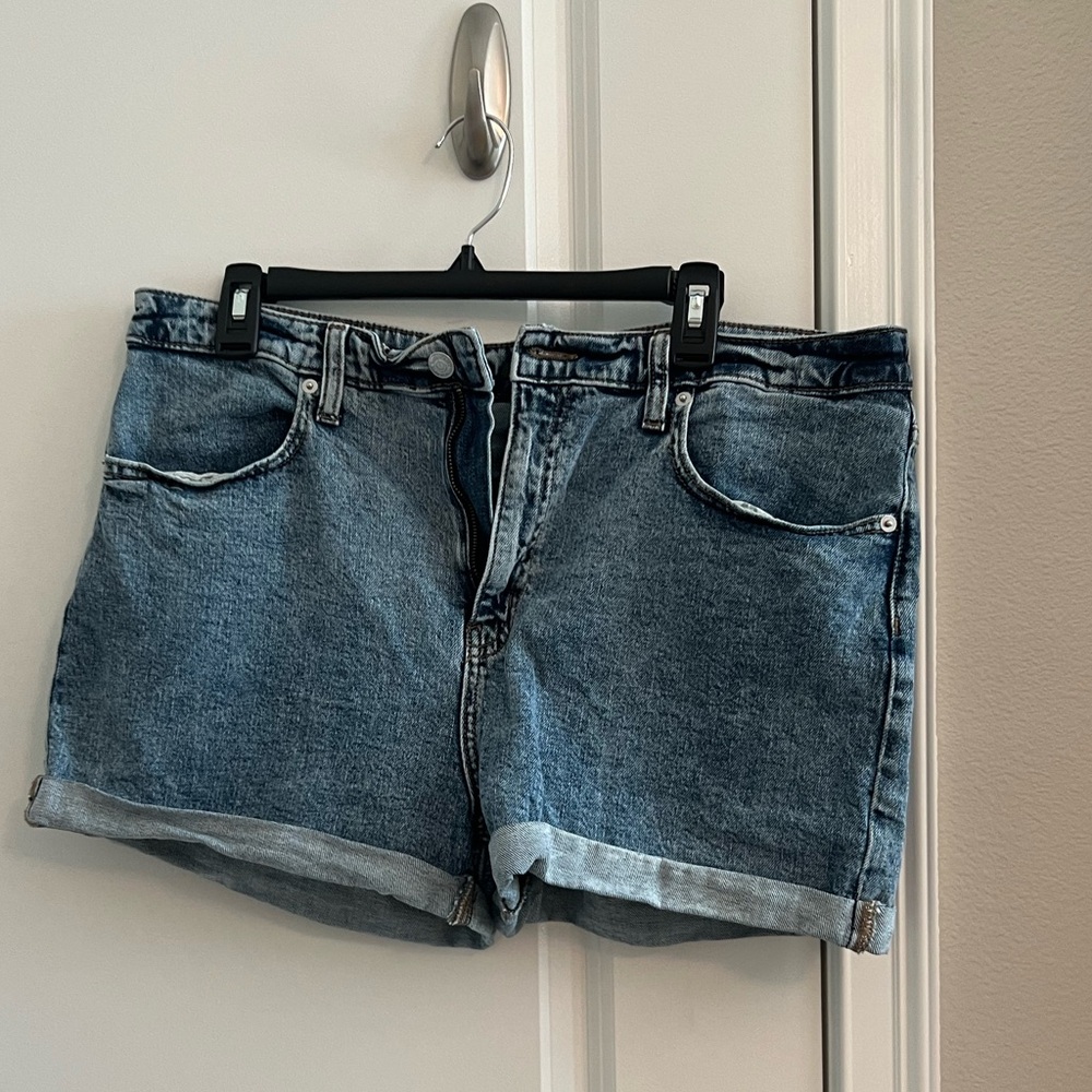 Never worn distressed jean shorts.